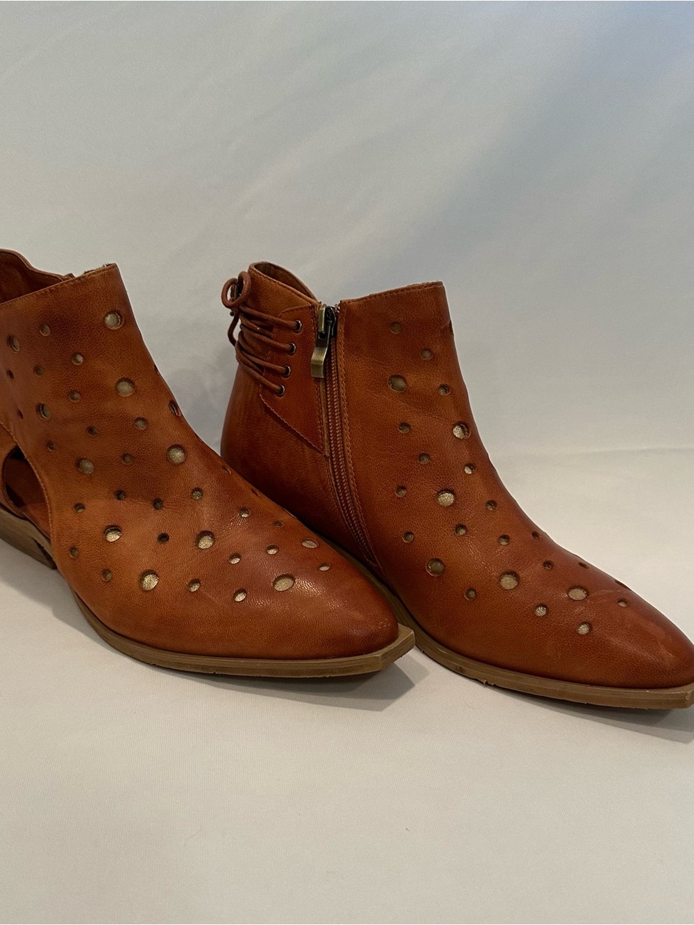 Antelope Cognac Brown Perforated Ankle Booties with Side Zip